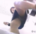 A Japanese video in which a woman is seen directly from below as she has a runny poop.